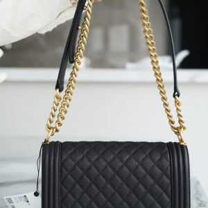 Chanel leboy 大球纹黑金中号 图1