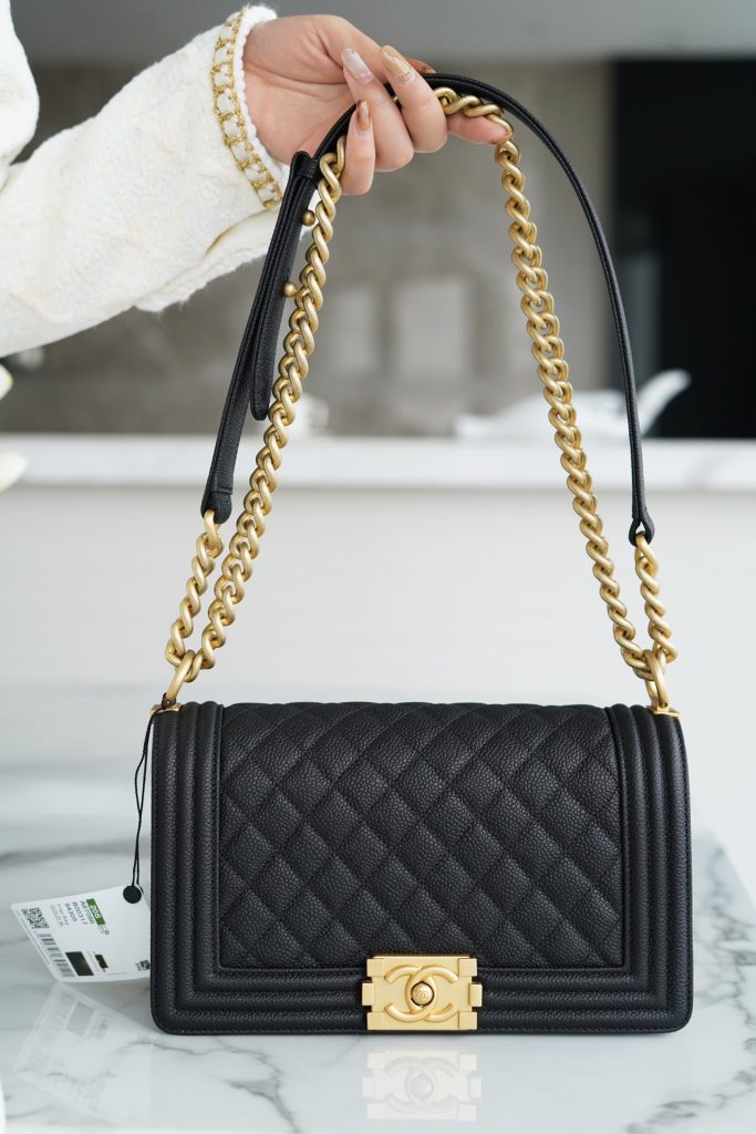 Chanel leboy 大球纹黑金中号 图1
